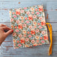Estuche Bruno  /Flores fondo celeste